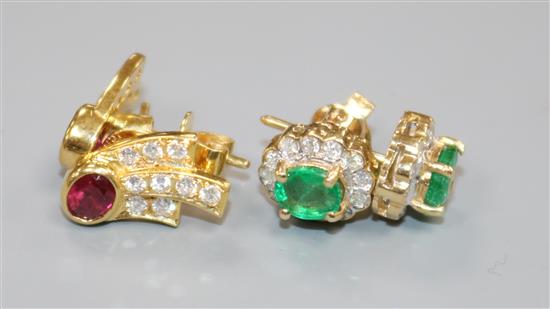 A pair of 14ct gold, emerald and diamond earrings and a pair of 18ct gold, ruby and diamond earrings